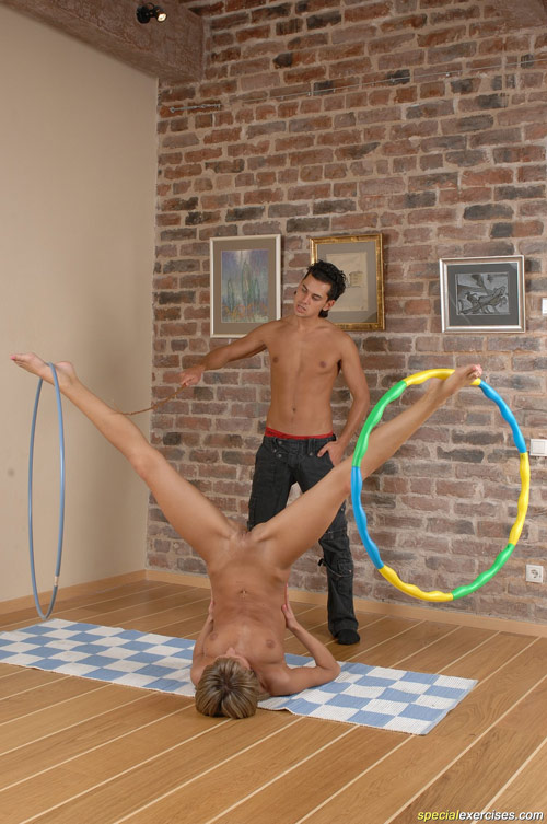 Special yoga exercises with two hula-hoops